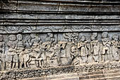 Candi Panataran - Main Temple. Krishnayana reliefs. The spoils of victory, female captives from Yawana.